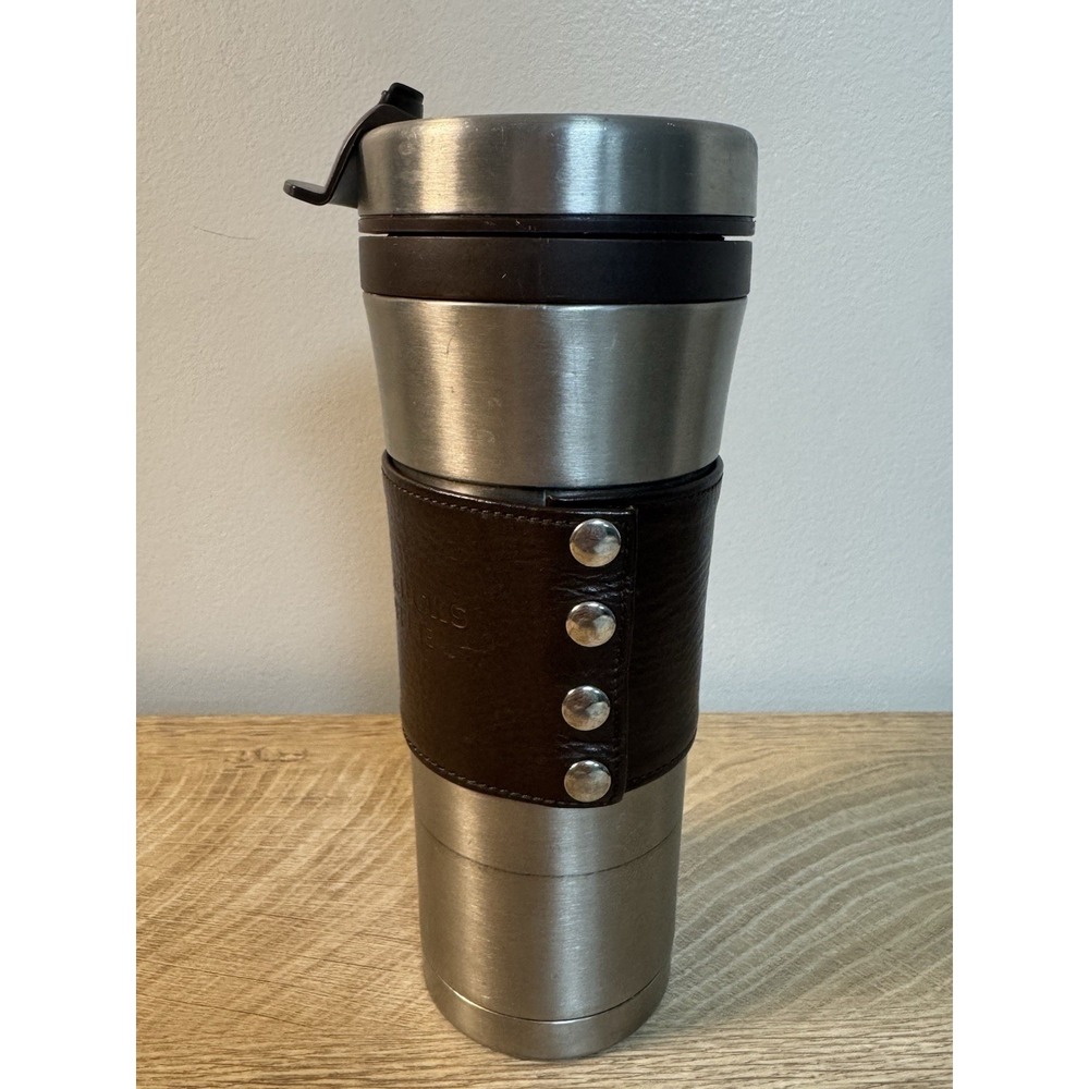STARBUCKS SILVER SNAP ON BROWN LEATHER SLEEVE STAINLESS STEEL TUMBLER 16 OZ 2010